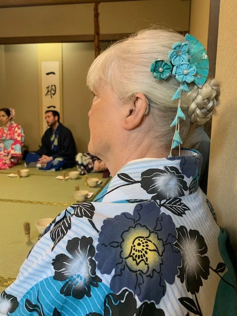 Lynn wearing a patterned kimono during her travels